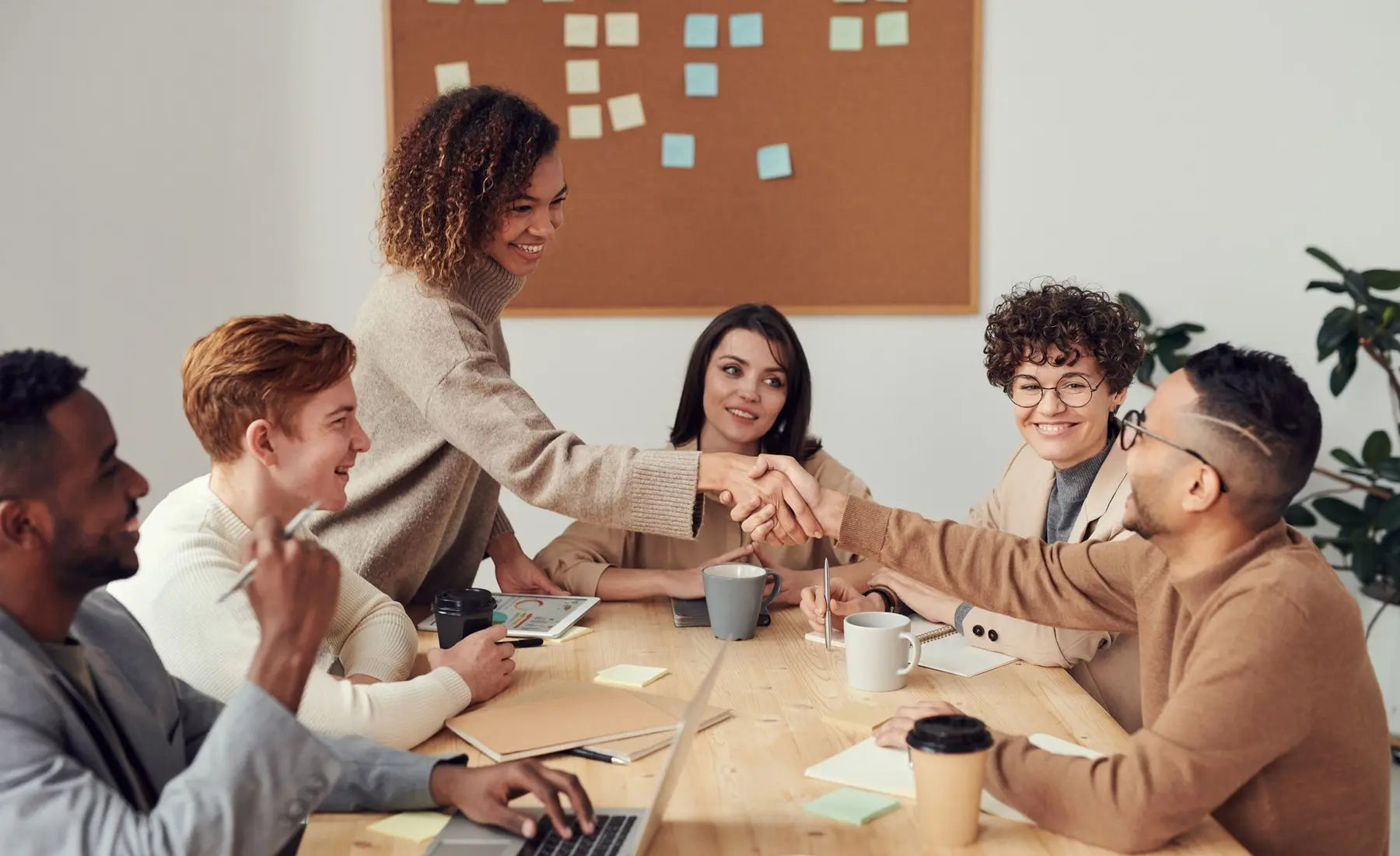 Calm operational office with people handling day-to-day work